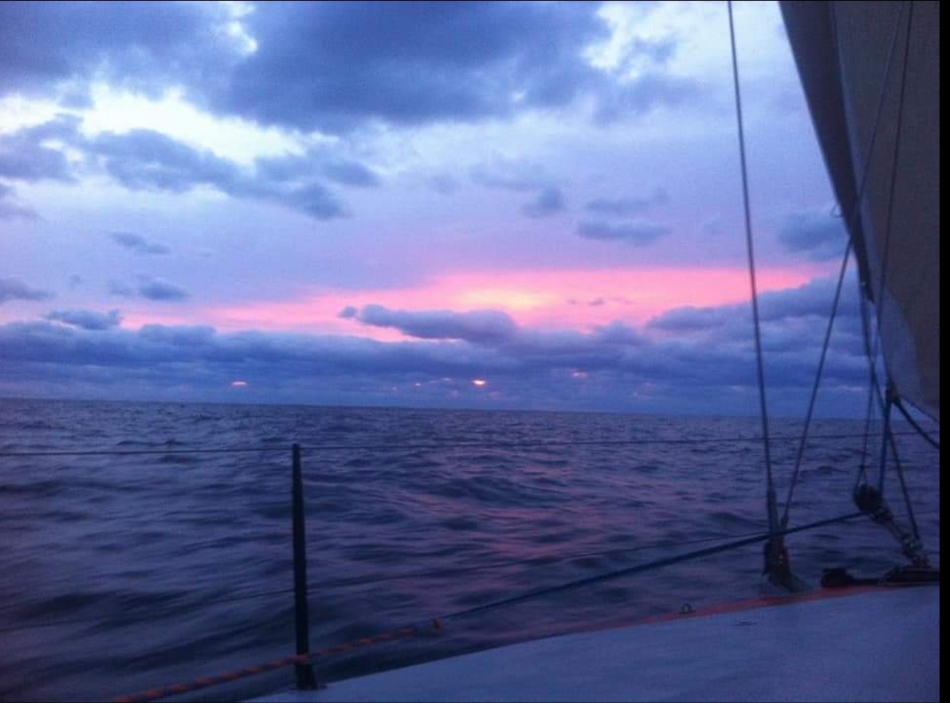 Red and pink sky at dawn over the Atlantic, taken from Challenger the morning before the storm