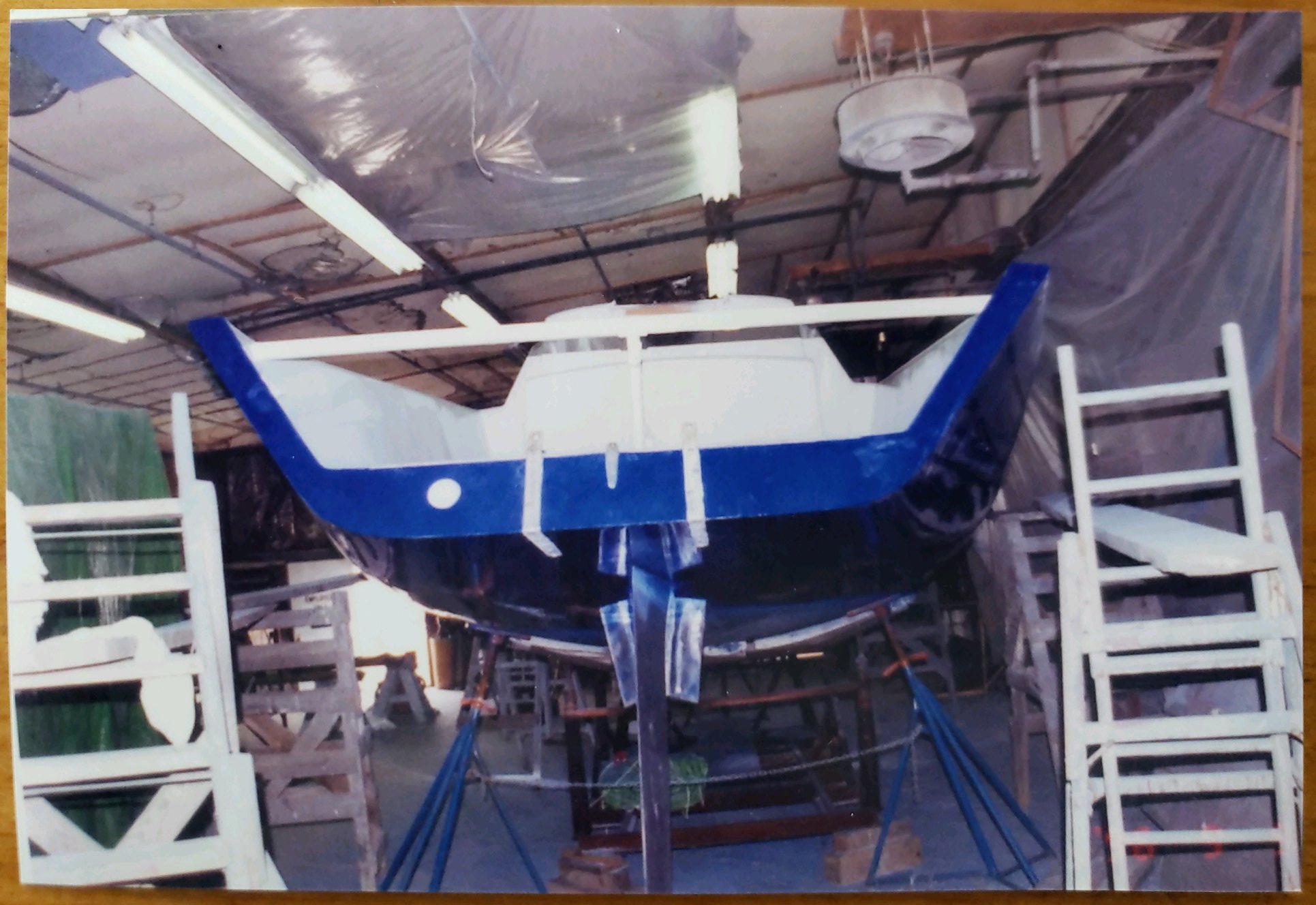 Stern view during restoration showing the Mumm 36 keel being fitted
