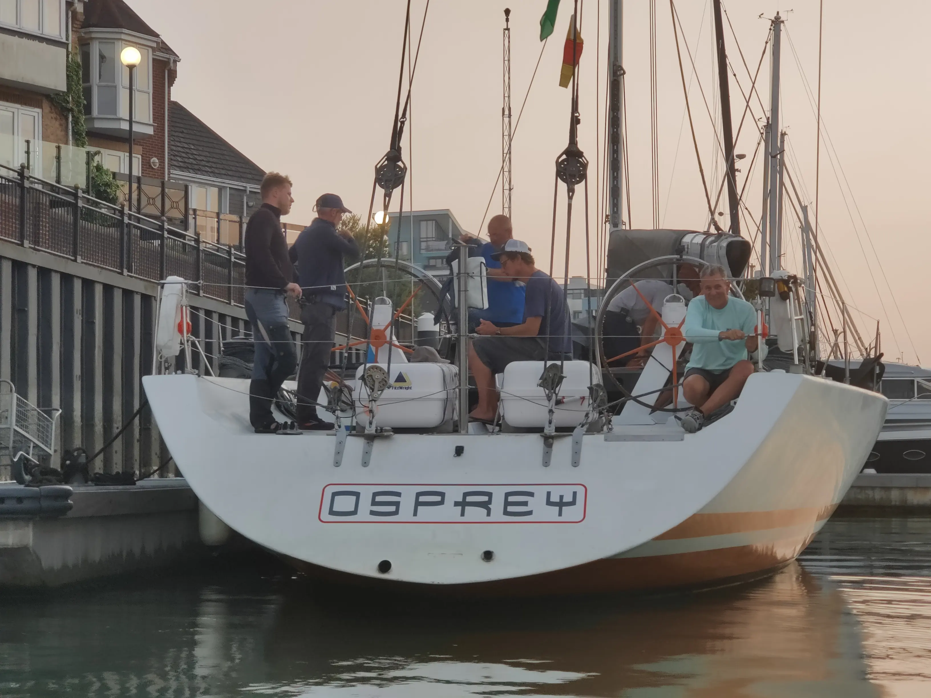 S/V Osprey after full rebrand — clean hull, custom vinyl decals