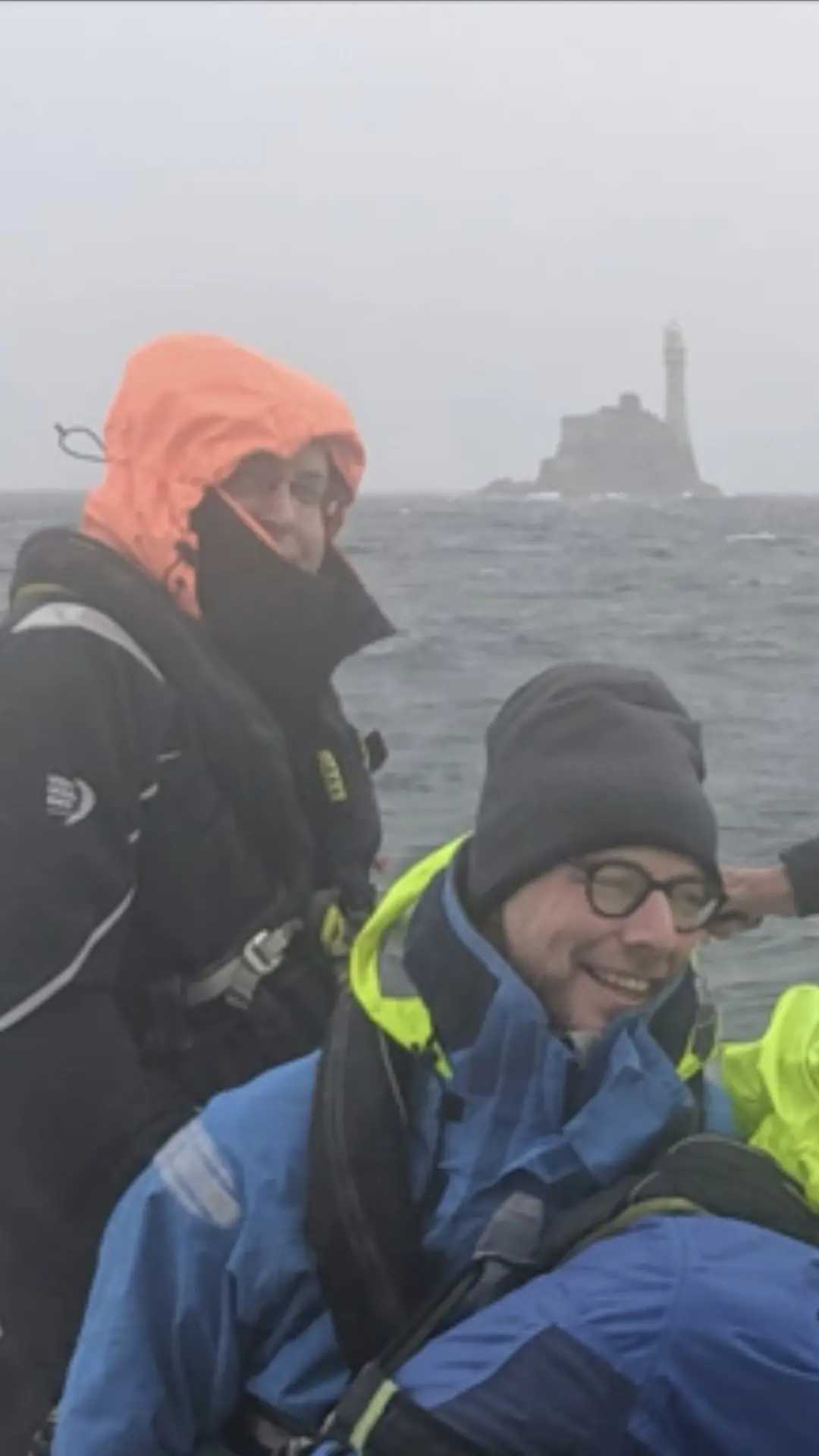 Crew at Fastnet Rock lighthouse in fog