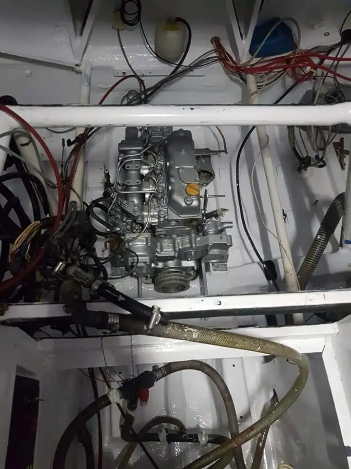 Engine bay floor with fresh epoxy enamel paint, sealed and protected