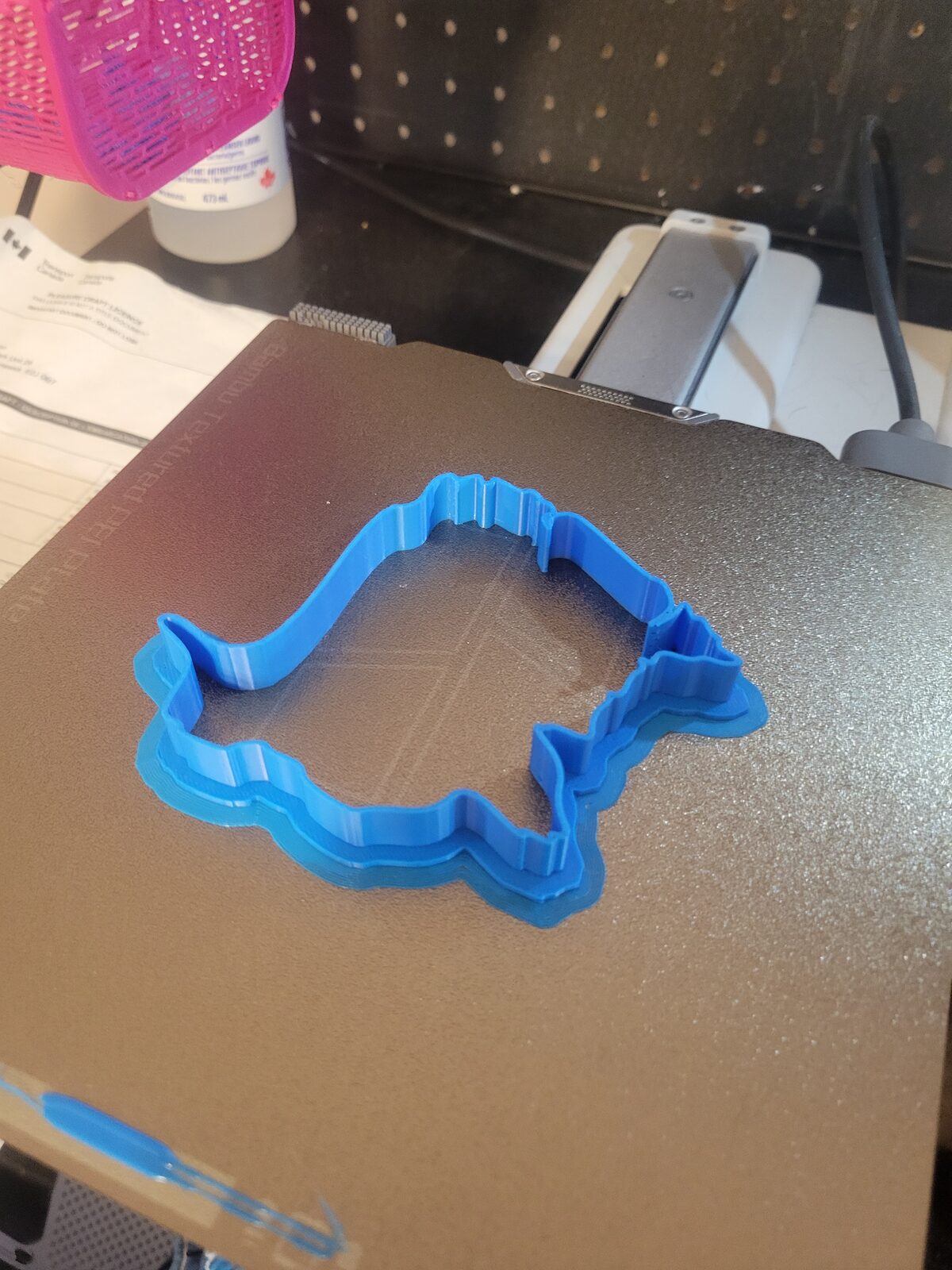 A blue 3D-printed New Brunswick province cookie cutter